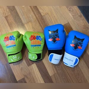 Two sets of kids boxing gloves